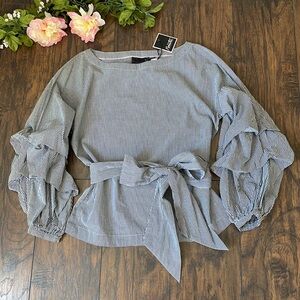 Beautiful belated boatneck gingham blouse